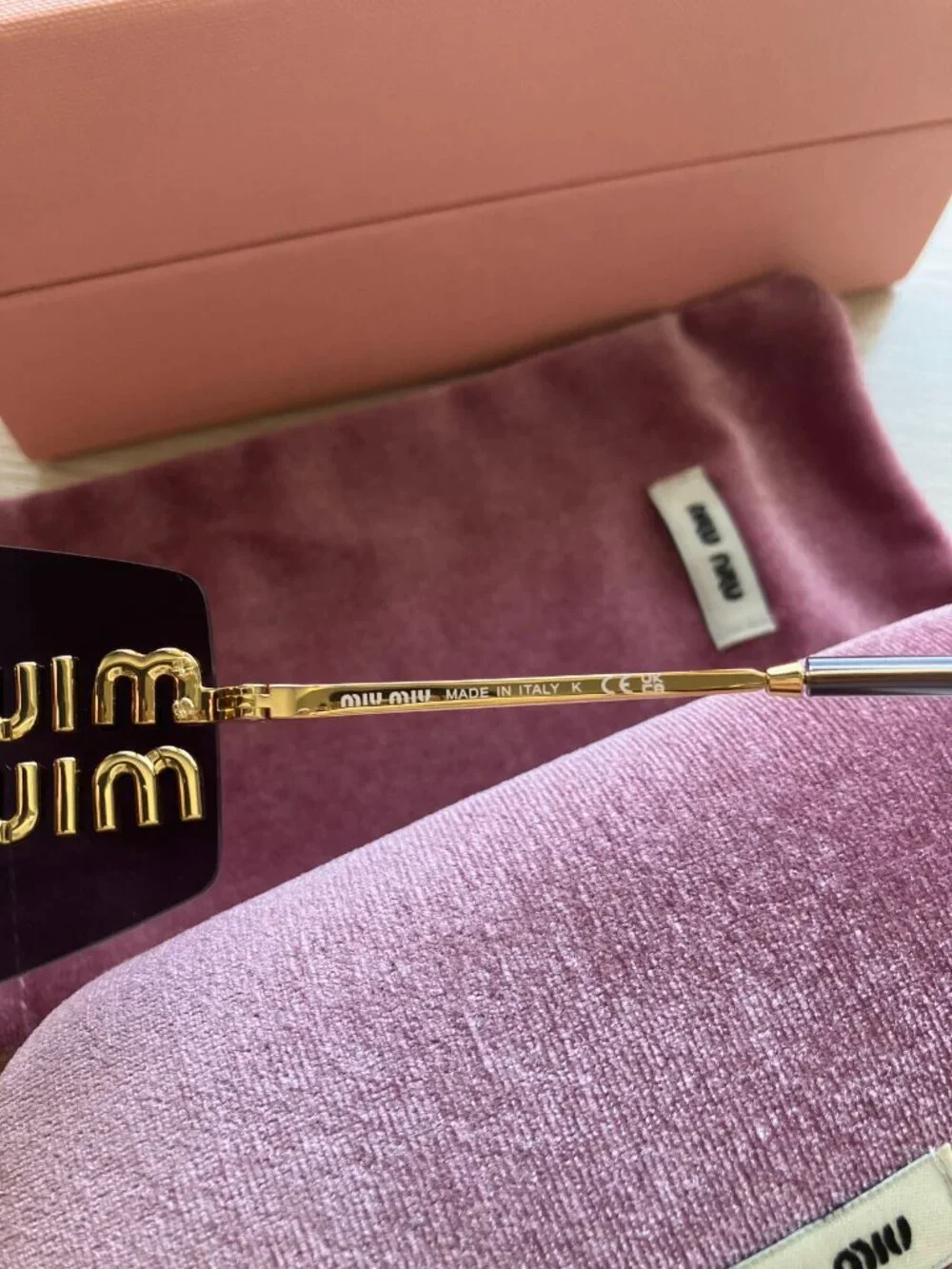 Miu Miu MU54YS Gold Logo Rimless Sunglasses